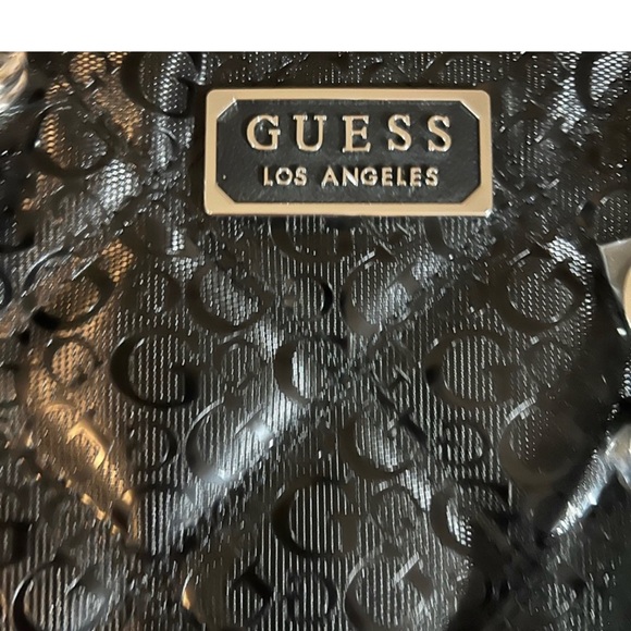 Guess Black shoulder bag. Like new! still has plastic on it and it’s authentic!! - Picture 6 of 8